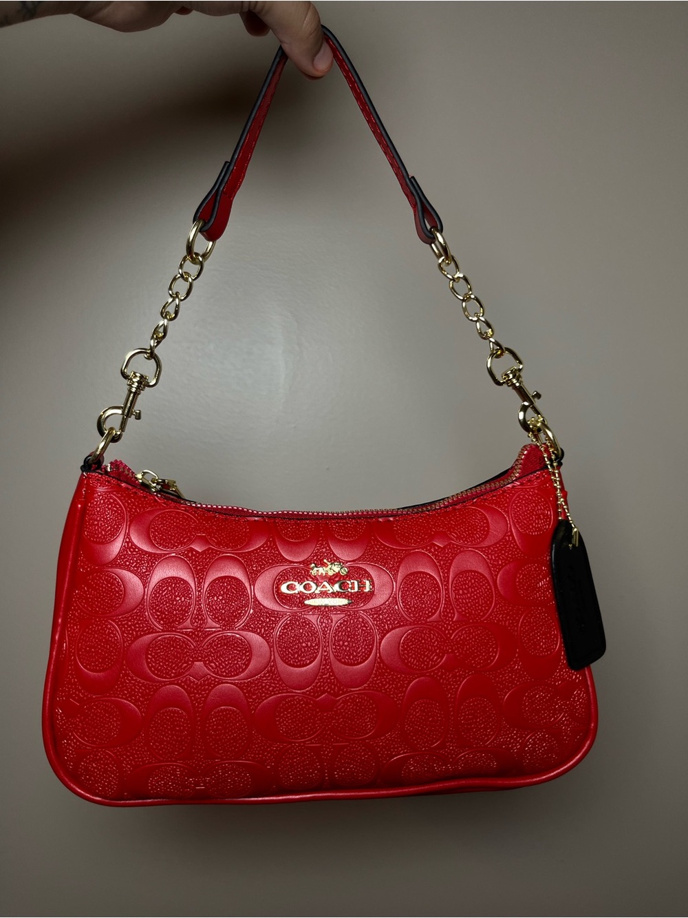 Red Signature Embossed Leather Shoulder Bag
